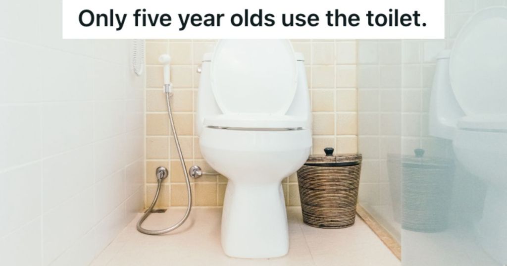 A toilet bowl in a small restroom